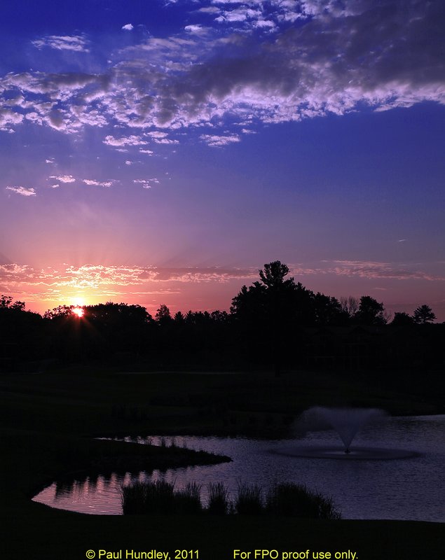 FPO proof - N103--0250-03  12x18  aRGB 5DMk2-16  RAW.jpg :: Sunrise over the par 3 second hole at The Castle Course at Northern Bay Resort, a public resort golf club located in Arkdale, WIsconsin.  The Castle Course is a mix of original holes and replicas of some of America's most famous golf holes. June,  2011; AM shoot.  Photograph by Paul Hundley.