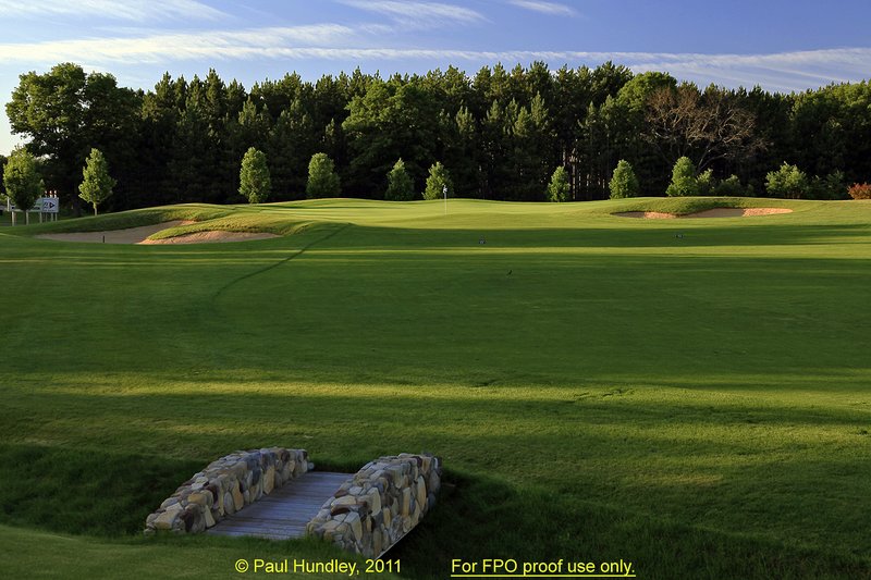 FPO proof - N103--0451-06  12x18  aRGB 5DMk2-16  RAW.jpg :: The par 4 fourth hole at The Castle Course at Northern Bay Resort, a public resort golf club located in Arkdale, WIsconsin.  The Castle Course is a mix of original holes and replicas of some of America's most famous golf holes.  This hole is a replica of the fifth hole at Oakland Hills (South).  June,  2011; PM shoot.  shoot.  Photograph by Paul Hundley.