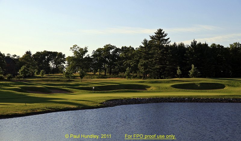 FPO proof - N103--1856-02  12x18  aRGB 5DMk2-16  RAW.jpg :: The par 5 finishing hole at The Castle Course at Northern Bay Resort, a public resort golf club located in Arkdale, WIsconsin.  The Castle Course is a mix of original holes and replicas of some of America's most famous golf holes.  This hole is a replica of the eighteenth hole at Arnold Palmer's Bay Hill Club.  June,  2011; PM shoot.  Photograph by Paul Hundley.