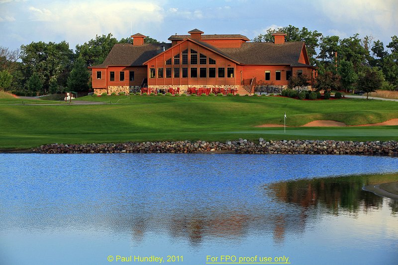 FPO proof - N103--1859-01  12x18  aRGB 5DMk2-16  RAW.jpg :: The clubhouse sits above the green on the par 5 finishing hole at The Castle Course at Northern Bay Resort, a public resort golf club located in Arkdale, WIsconsin.  The Castle Course is a mix of original holes and replicas of some of America's most famous golf holes.  The eighteenth is a replica of the eighteenth hole at Arnold Palmer's Bay Hill Club.  June,  2011; AM shoot.  Photograph by Paul Hundley.