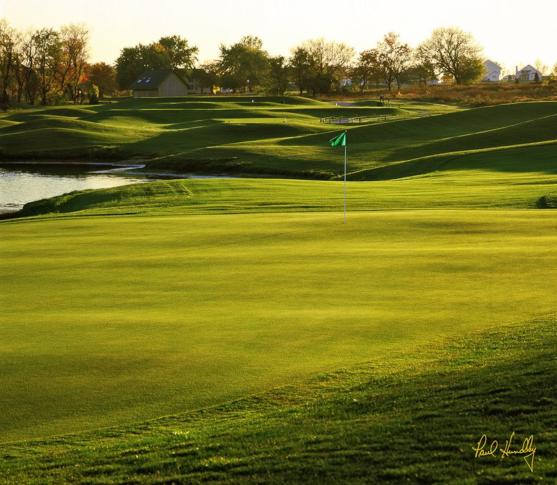 G100a--0801  1200px  E1  SS.jpg :: The par three 8th hole (from behind) on the Palmer Course at the Geneva National Golf Club in Lake Geneva, Wisconsin.  The course was designed by Arnold Palmer Designs.  Photograph by Paul Hundley. Summer, 1996.  PM shoot.
