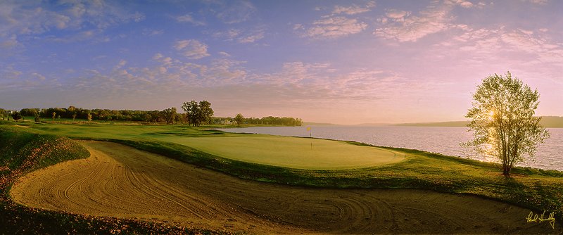 G100a--1701  1200px  E2  SS.jpg :: The par five 17th hole (from behind) at sunrise on the Palmer Course at the Geneva National Golf Club in Lake Geneva, Wisconsin.  The course was designed by Arnold Palmer Designs.  Photograph by Paul Hundley. Summer, 1996.  AM shoot.