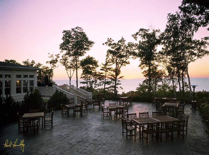 H102--0007  800px.jpg :: Patio off of the Members' Clubhouse, with a view over Green Bay, at sunset; Horseshoe Bay GC; Egg Harbor, Wisconsin