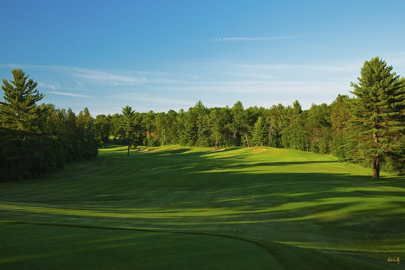 N103--1352  V1  1500px  SS (with signature).jpg :: The par 4 thirteenth hole at The Castle Course at Northern Bay Resort, a public resort golf club located in Arkdale, WIsconsin.  The Castle Course is a mix of original holes and replicas of some of America's most famous golf holes.  June,  2011; PM shoot.  Photograph by Paul Hundley.