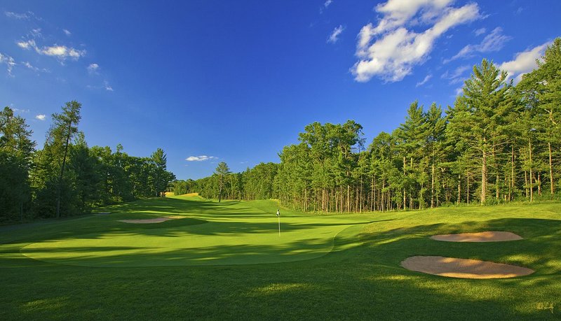 N103--1550  V1  1500px  SS (with signature).jpg :: The par 5 fifteenth hole (from behind the green) at The Castle Course at Northern Bay Resort, a public resort golf club located in Arkdale, WIsconsin.  The Castle Course is a mix of original holes and replicas of some of America's most famous golf holes.  June,  2011; PM shoot.  Photograph by Paul Hundley.