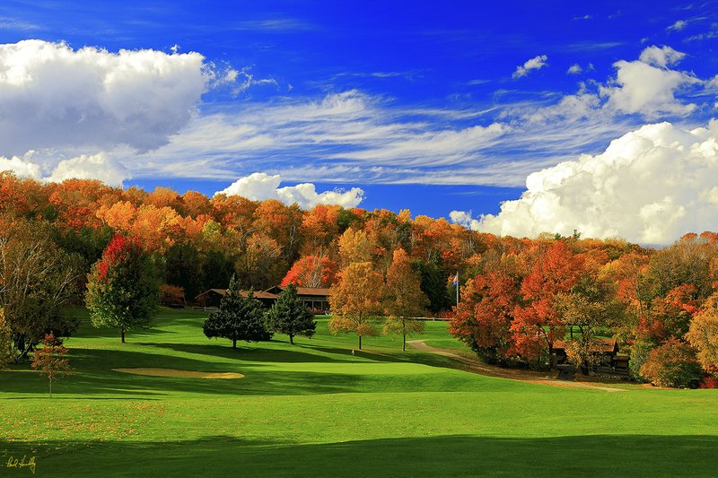P101--0950  1500px  V2  SS.jpg :: 9th hole (with the clubhouse in the background) at Peninsula State Park GC, a daily fee golf course in Ephraim, Door County, Wisconsin.  Photograph by Paul Hundley.  October, 2010.  PM shoot.