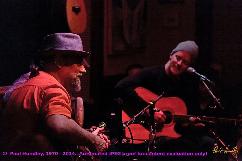 Approval proof - Peter Paul and Willy at Cafe Carpe by Paul Hundley - 15 - 04.jpg :: Paul Cebar and Willy Porter (left to right) perform (along with Peter Mulvey, hidden) together for the first time to a sellout audience of 70 at the Cafe Carpe in Fort Atkinson, Wisconsin.  December 10, 2014.  Photograph by Paul Hundley
