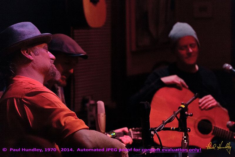 Approval proof - Peter Paul and Willy at Cafe Carpe by Paul Hundley - 17.jpg :: Paul Cebar, Peter Mulvey and Willy Porter (left to right) perform together for the first time to a sold-out crowd of 70 at the Cafe Carpe in Fort Atkinson, Wisconsin.  December 10, 2014.  Photograph by Paul Hundley
