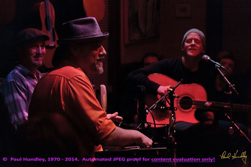 Approval proof - Peter Paul and Willy at Cafe Carpe by Paul Hundley - 21 - 08_1.jpg :: Peter Mulvey, Paul Cebar and Willy Porter (left to right) perform together for the first time to a sellout audience of 70 at the Cafe Carpe in Fort Atkinson, Wisconsin.  December 10, 2014.  Photograph by Paul Hundley