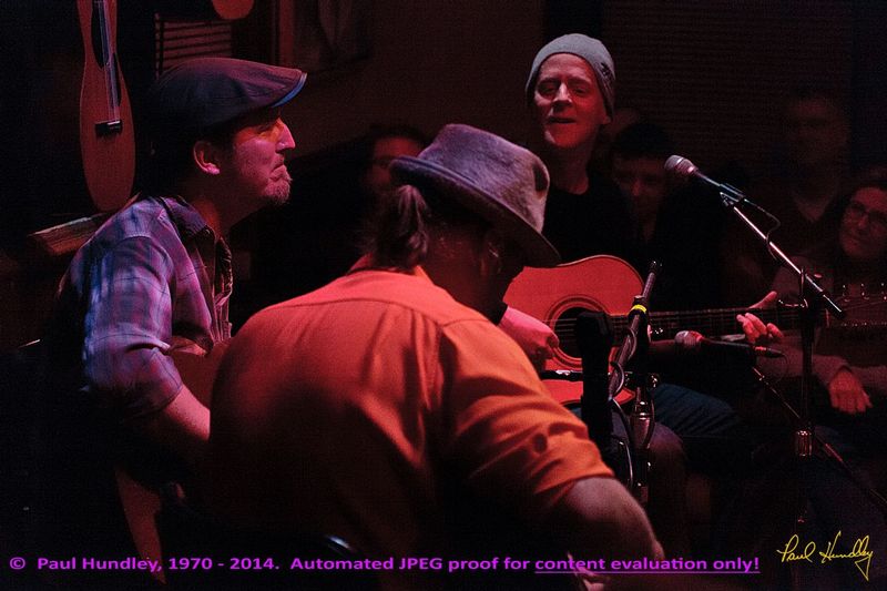 Approval proof - Peter Paul and Willy at Cafe Carpe by Paul Hundley - 36 - 02.jpg :: Peter Mulvey, Paul Cebar and Willy Porter (left to right) perform together for the first time to a sellout audience of 70 at the Cafe Carpe in Fort Atkinson, Wisconsin.  December 10, 2014.  Photograph by Paul Hundley