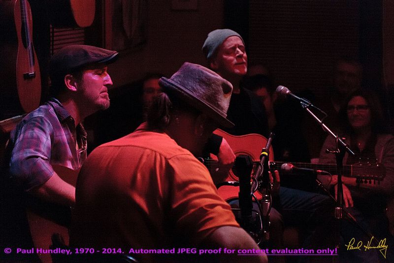 Approval proof - Peter Paul and Willy at Cafe Carpe by Paul Hundley - 36 - 03.jpg :: Peter Mulvey, Paul Cebar and Willy Porter (left to right) perform together for the first time to a sellout audience of 70 at the Cafe Carpe in Fort Atkinson, Wisconsin.  December 10, 2014.  Photograph by Paul Hundley