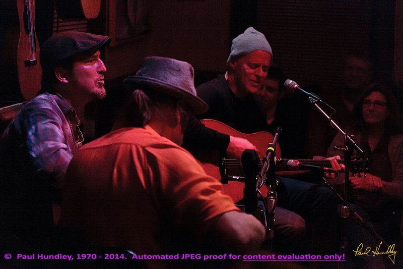 Approval proof - Peter Paul and Willy at Cafe Carpe by Paul Hundley - 48 - 04.jpg :: Peter Mulvey, Paul Cebar and Willy Porter (left to right) perform together for the first time to a sellout audience of 70 at the Cafe Carpe in Fort Atkinson, Wisconsin.  December 10, 2014.  Photograph by Paul Hundley
