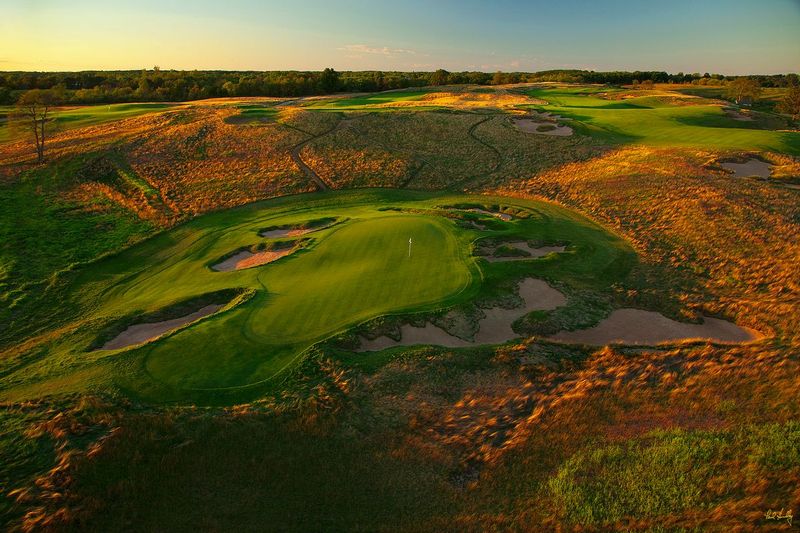 E101--0971  V2  2000px with signature  SS.jpg :: The par three 9th hole at Erin Hills, a daily fee golf course in Erin, Wisconsin.  Erin Hills was designed by Hurdzan/Fry and Ron Whitten and built by Landscapes Unlimited, LLC, and has been choosen to host the 2011 US Amateur Chanpionship and the 2017 US Open Championship.  Photo by Paul Hundley; taken in September, 2012.