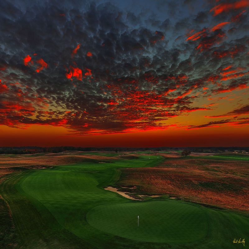 E101--1892  V1  1200px  SS  with signature.jpg :: The par five closing hole at Erin Hills, a daily fee destination golf course and resort in Erin, Wisconsin and site of the 2017 US Open Championship.  The course was designed by Hurdzan/Fry and Ron Whitten and built by Landscapes Unlimited, LLC.  It opened for play in 2006 and has already hosted the 2011 US Amateur Chanpionship and the 2008 Women's Amateur Public Links.  Photograph and copyright by Paul Hundley, September, 2014.