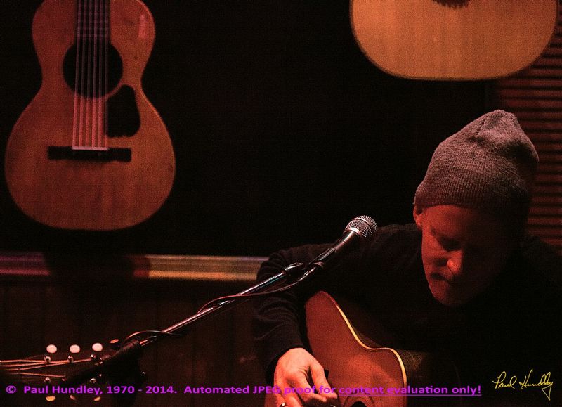 Peter Paul and Willy at Cafe Carpe by Paul Hundley - 66.jpg :: Willy Porter performs (with Peter Mulvey and Paul Cebar) to a sellout audience of 70 at the Cafe Carpe in Fort Atkinson, Wisconsin.  December 10, 2014.  Photograph by Paul Hundley