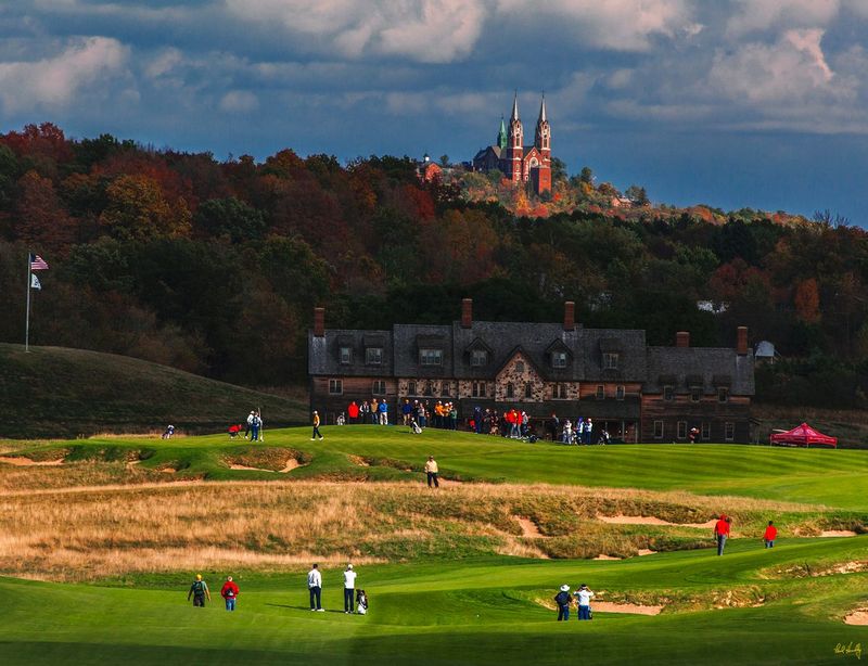 E101--1846  V3.jpg :: The 18th hole at Erin Hills with the Erin Hills Lodge and Holy Hill.