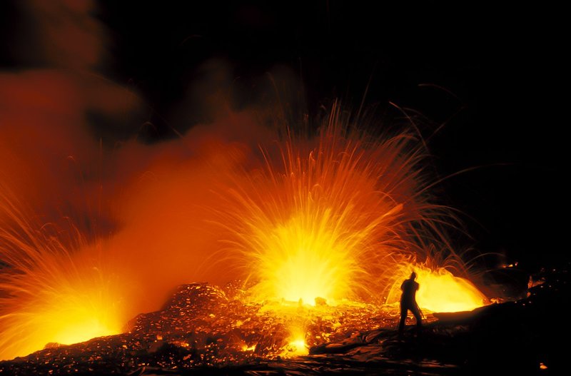 GBL-VLO-74.jpg :: Photographer by exploding lava. Kilauea Volcano. Hawaii Volcanoes National Park. Island of Hawaii.