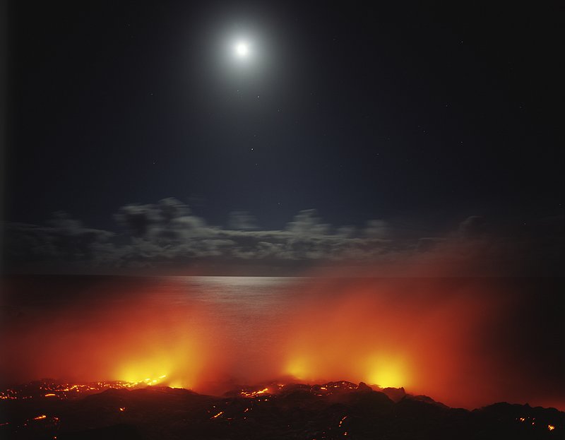 GBL-VLO-8.jpg :: Lava flows from the rocky shore of Hawaii Volcanoes National Park into the sea
