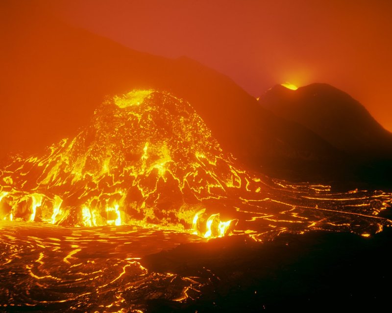 GBL-VLS-28.jpg :: Lava flows out of a vent in Kilauea Volcano creating a river o pahoehoe lava
