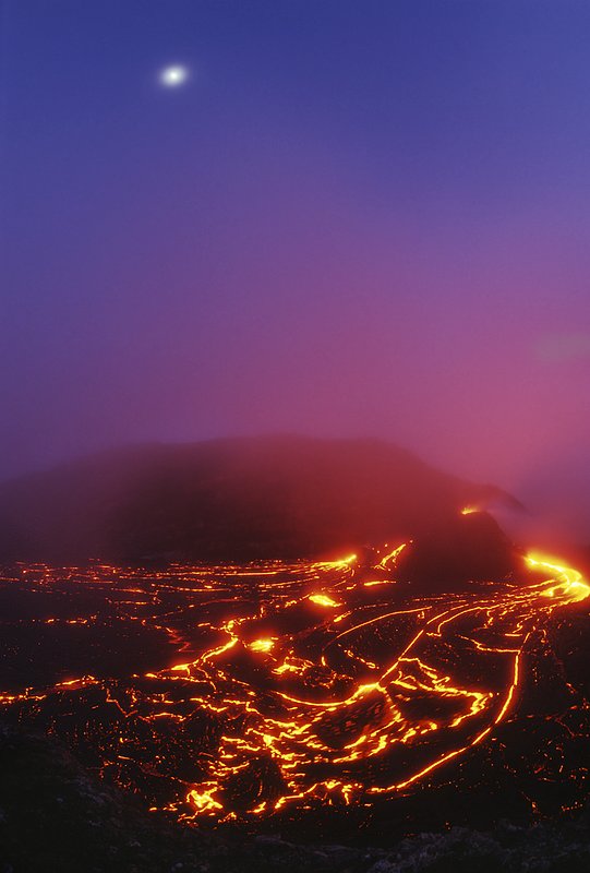 GBL-VLS-38.jpg :: Nightview of lava streams in a rocky background with the moon hoovering above