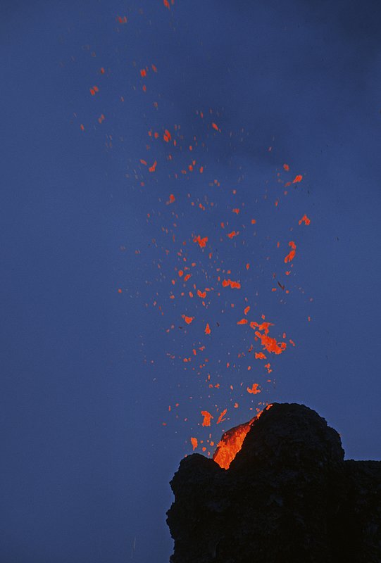 GBL-VLS-44.jpg :: Vent spitting out tephra against a blue sky at dusk
