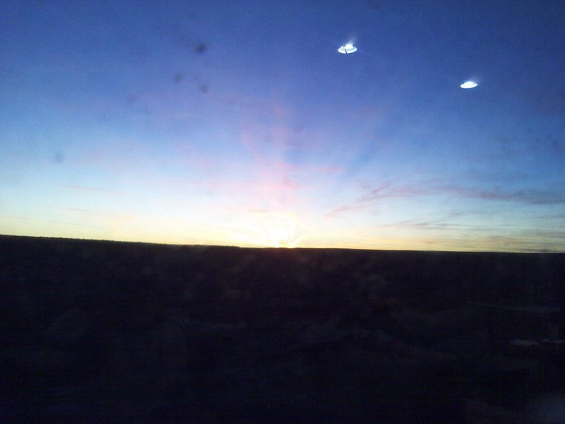 IFO PHOTO...REFLECTIONS IN THE WINDOW OF RECESS LIGHTING--MUFON 37459.jpg