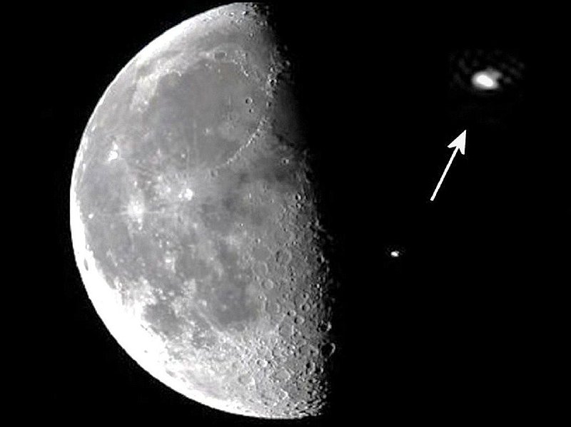 UFO ORBITING THE MOON--NASA PHOTO 440857--UFO Casebook1.jpg :: YY